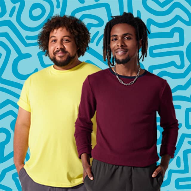 Two people standing side by side.