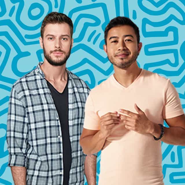 Two people standing side by side.